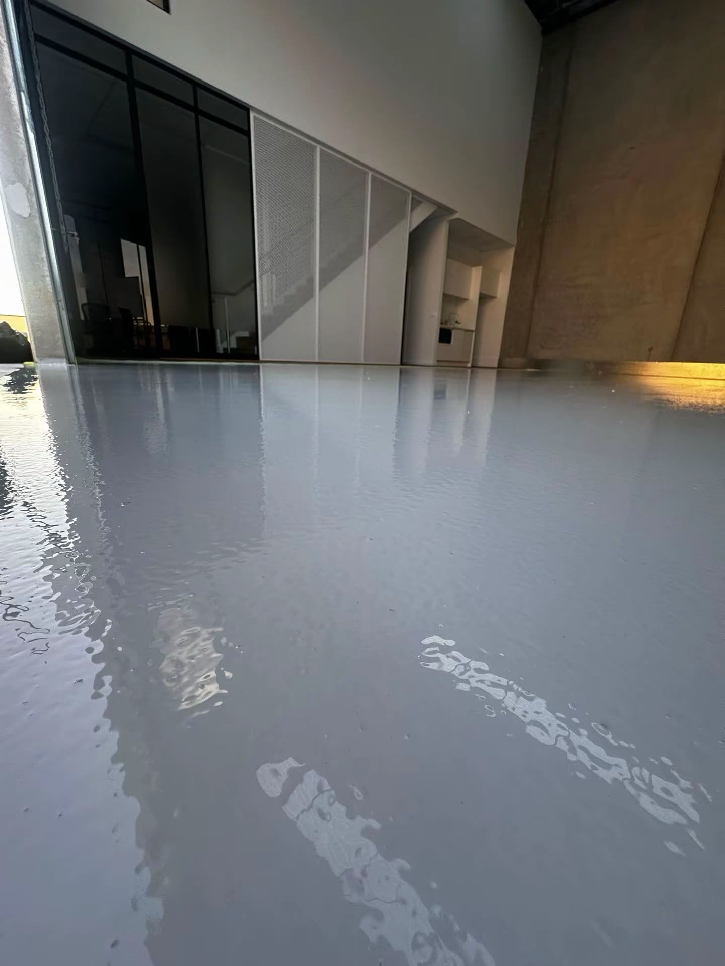 High gloss grey epoxy floor mirror reflection — Clyde
