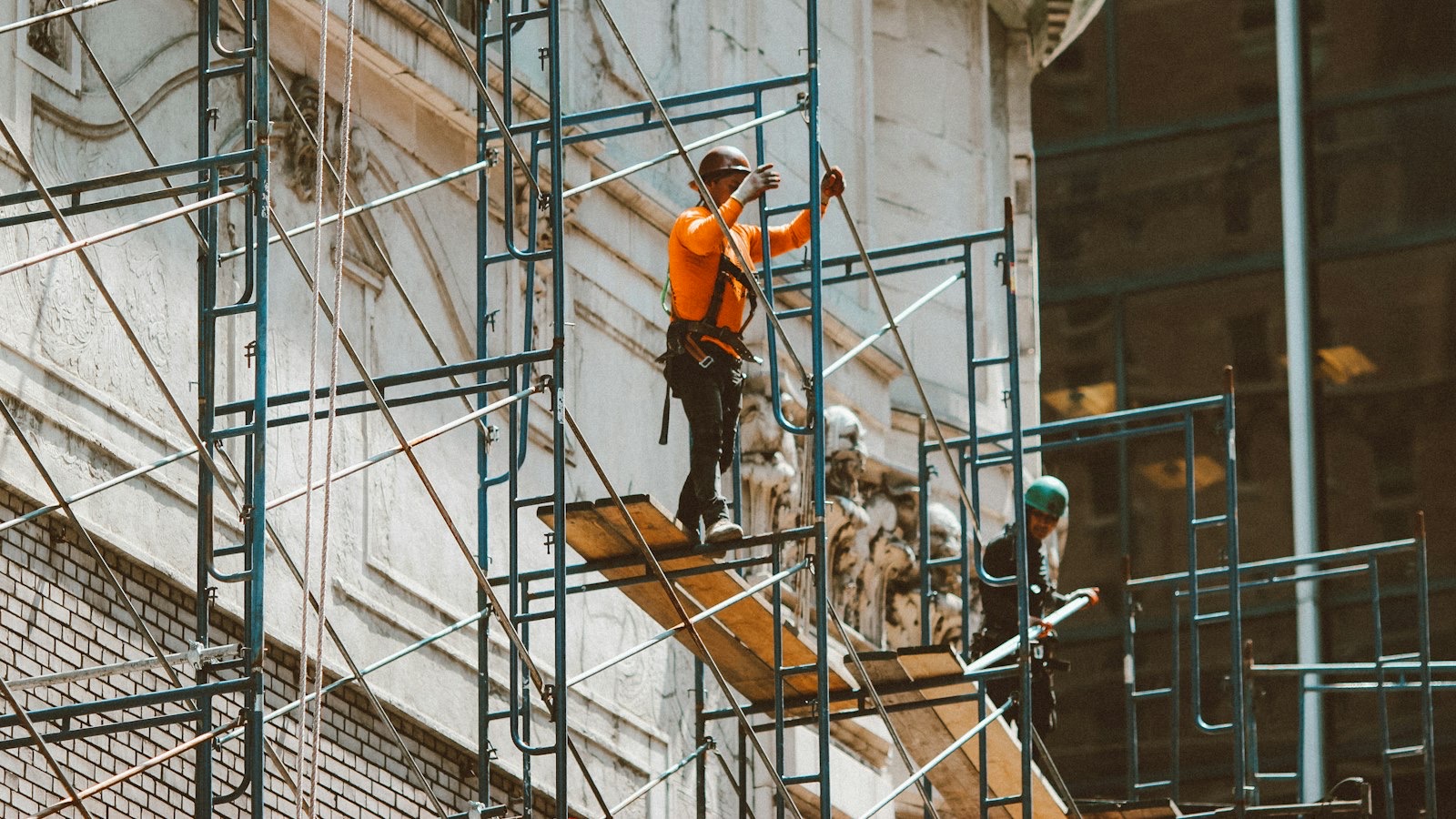 Commercial painter working on a warehouse in Melbourne's northern suburbs