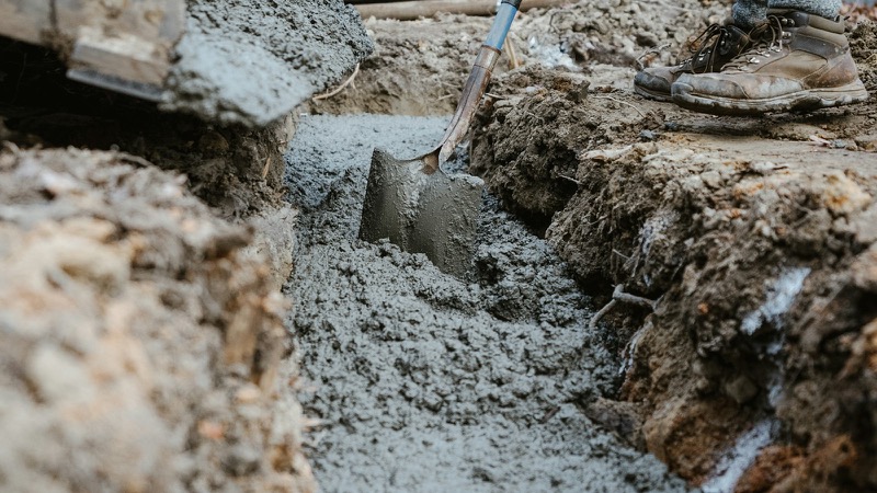 Concrete being poured and placed