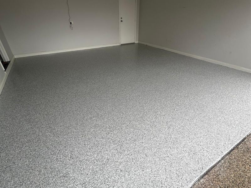 Double garage epoxy floor white grey flake finish