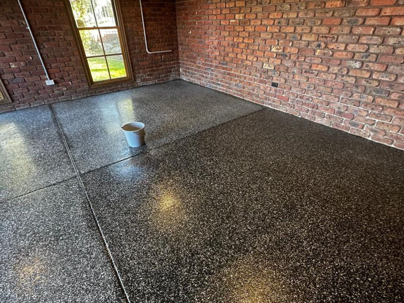 Double garage epoxy floor timber ceiling brick walls