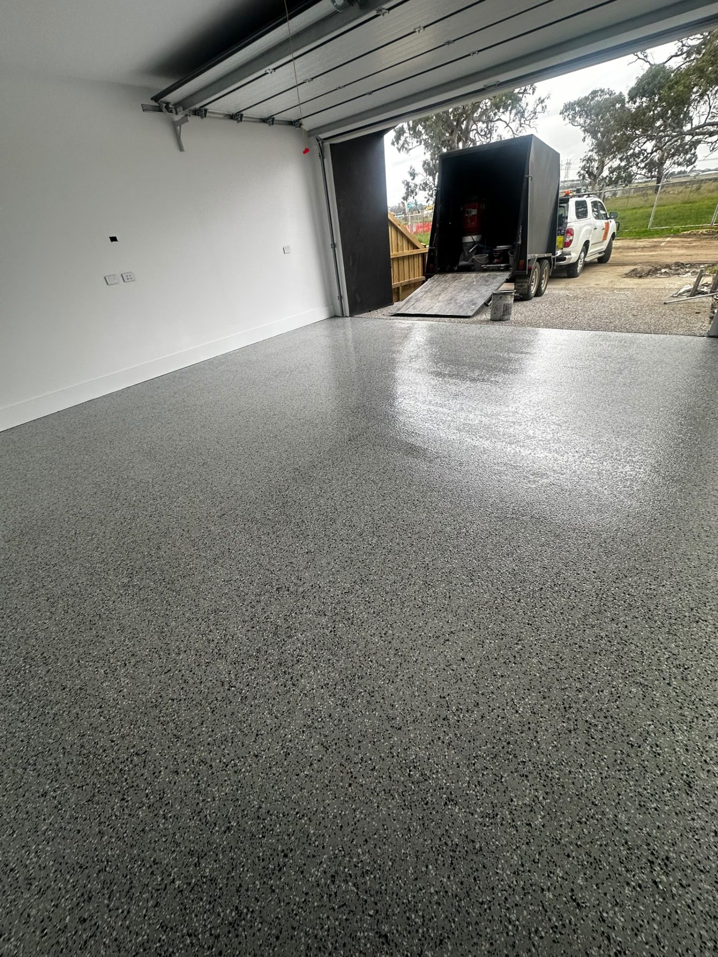 Double garage epoxy floor grey flake install day