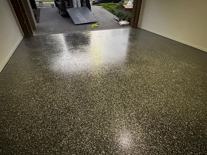 Double garage epoxy floor completed at dusk