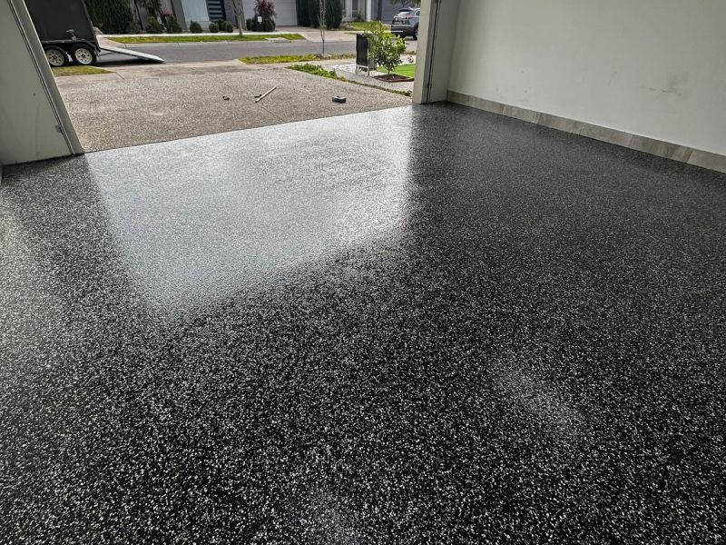 Double garage epoxy floor looking out to street