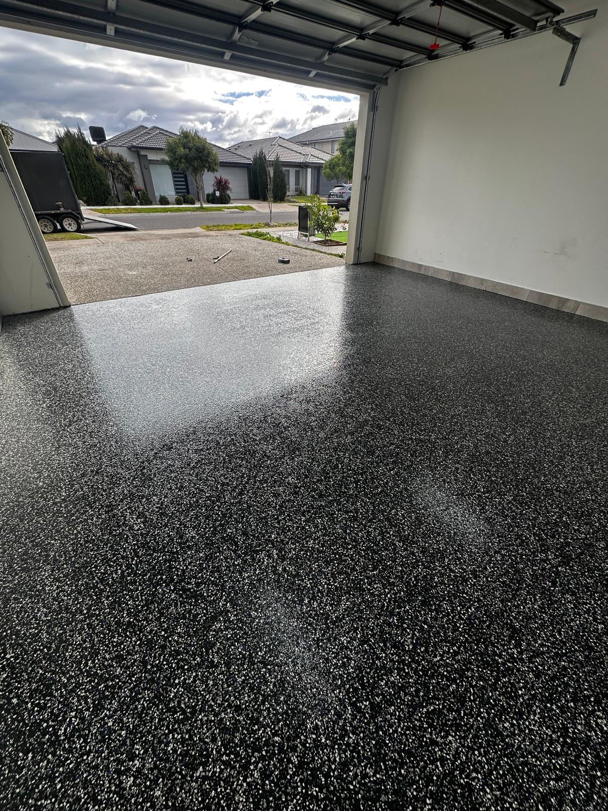 Double garage epoxy floor looking out to street