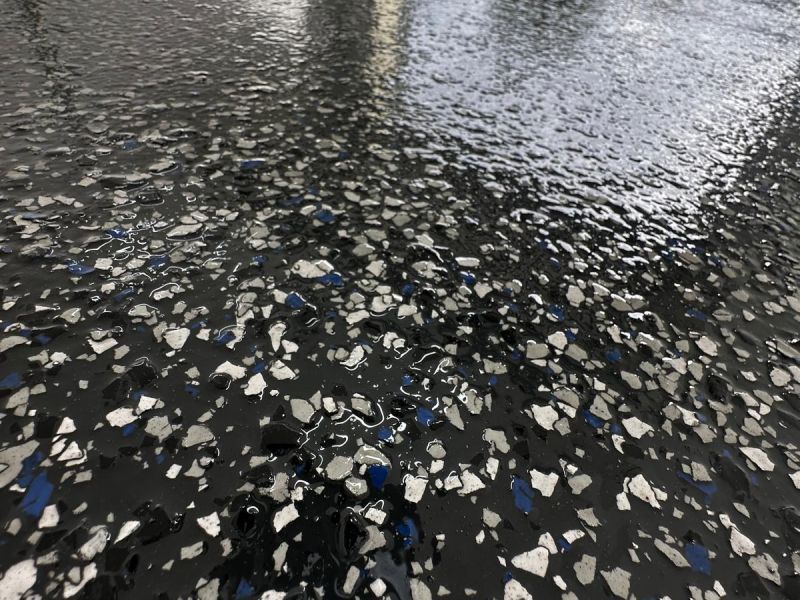 Blue white black flake epoxy close up detail