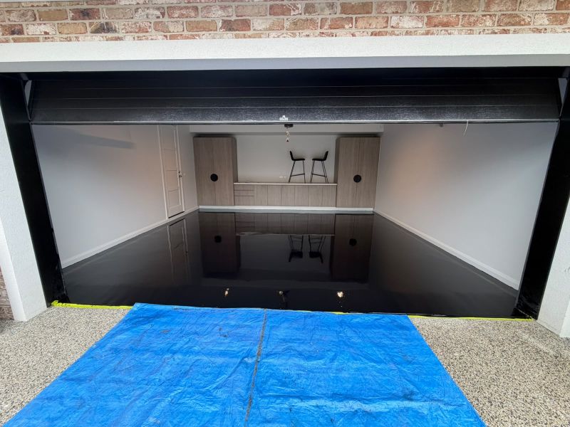 Metallic epoxy floor garage conversion entertaining space