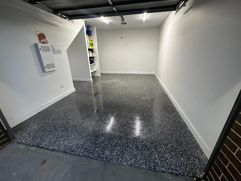 Single garage epoxy floor charcoal flake finish