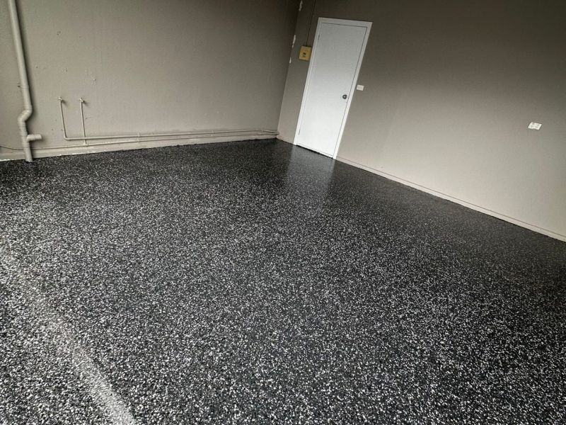 Single garage epoxy floor flake finish wall to wall